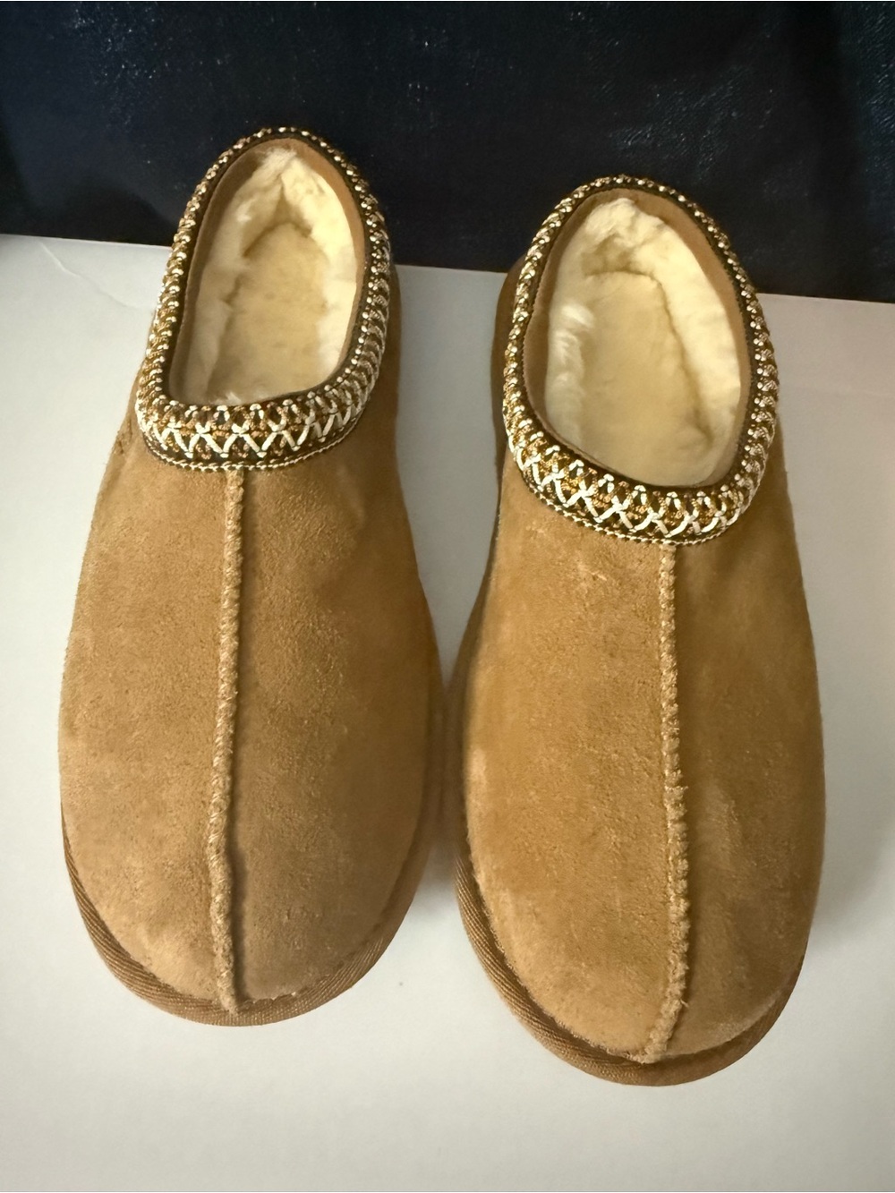 UGG women’s Tasman slippers. Chestnut Suede Shearling-Lined Slip-On Loafers